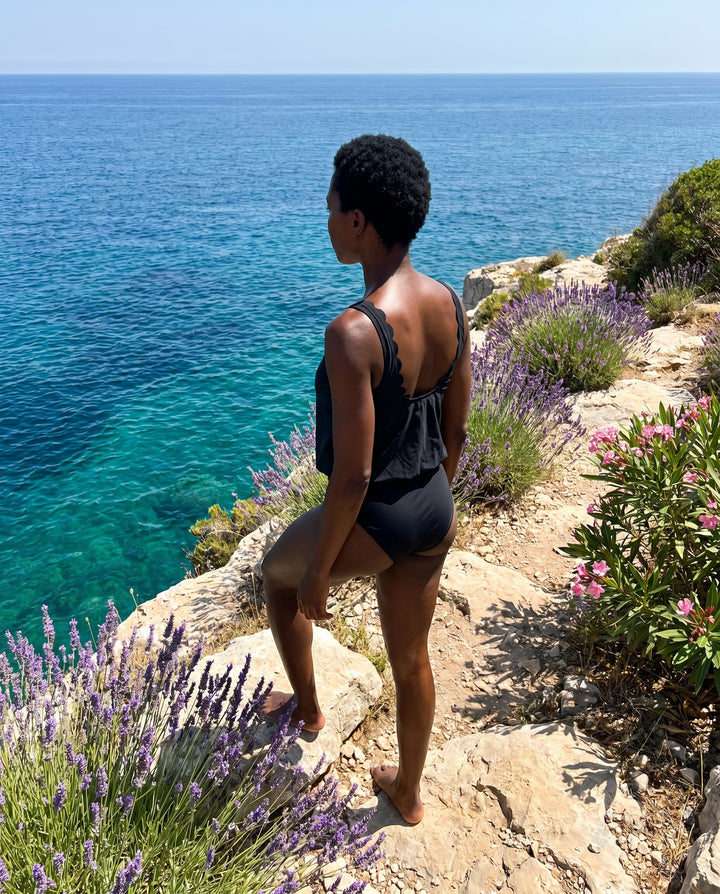 The Overnight One-Piece — Wide environmental hero (cleo)